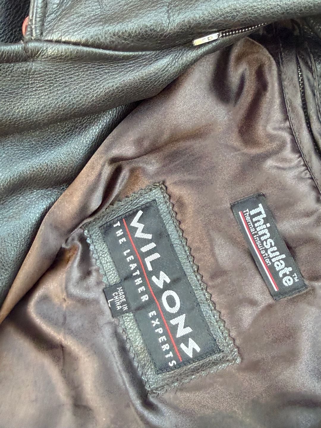 Vintage Wilson’s Leather embellishments 90s jacket size large belt loop