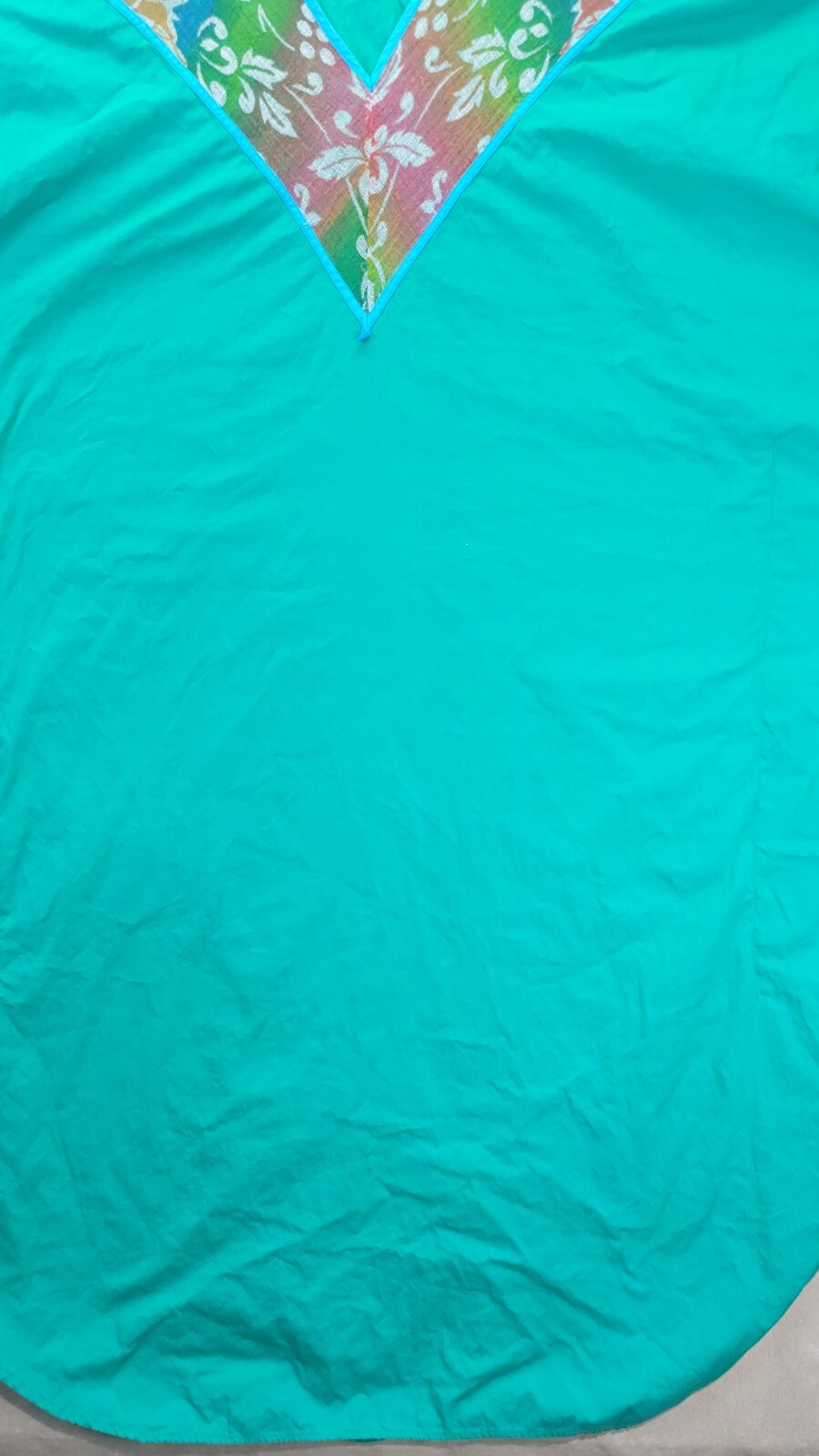 Vintage Womens Teal Muumuu With A Multi Colored Cheese Cloth Vneck Design