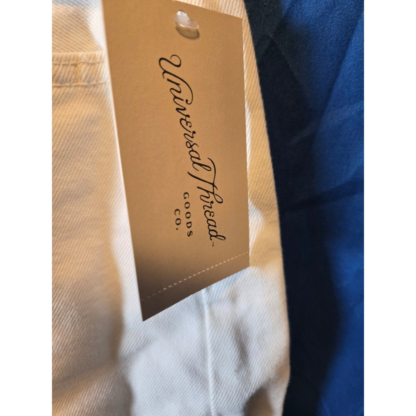 White baggy fit 90s shorts with button front. Size16-18