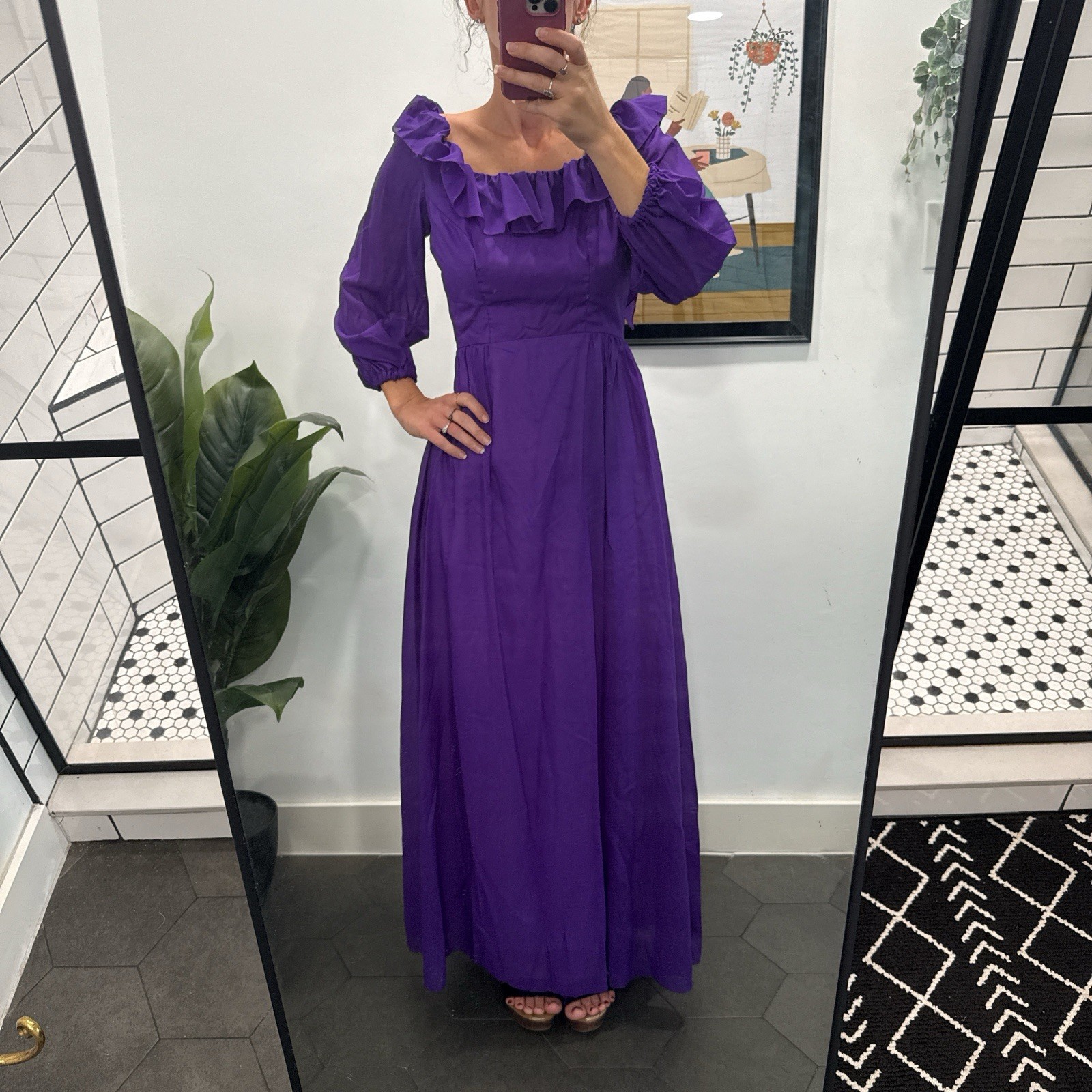 An vintage Priscilla Of Boston Chic long sleeve dress with ruffles.