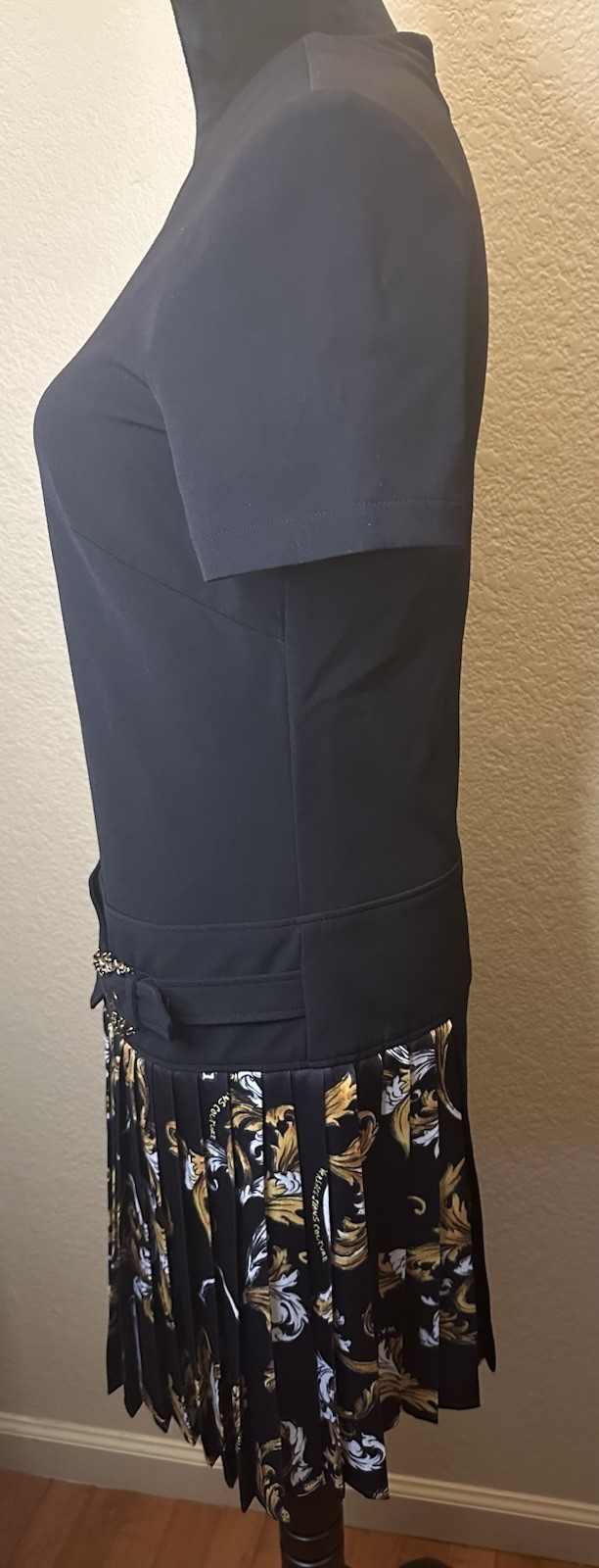 Black Asymmetrical Skirt with Floral Pleated Panel and Buckle Accent