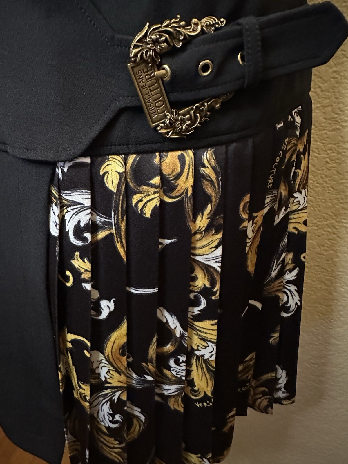 Black Asymmetrical Skirt with Floral Pleated Panel and Buckle Accent