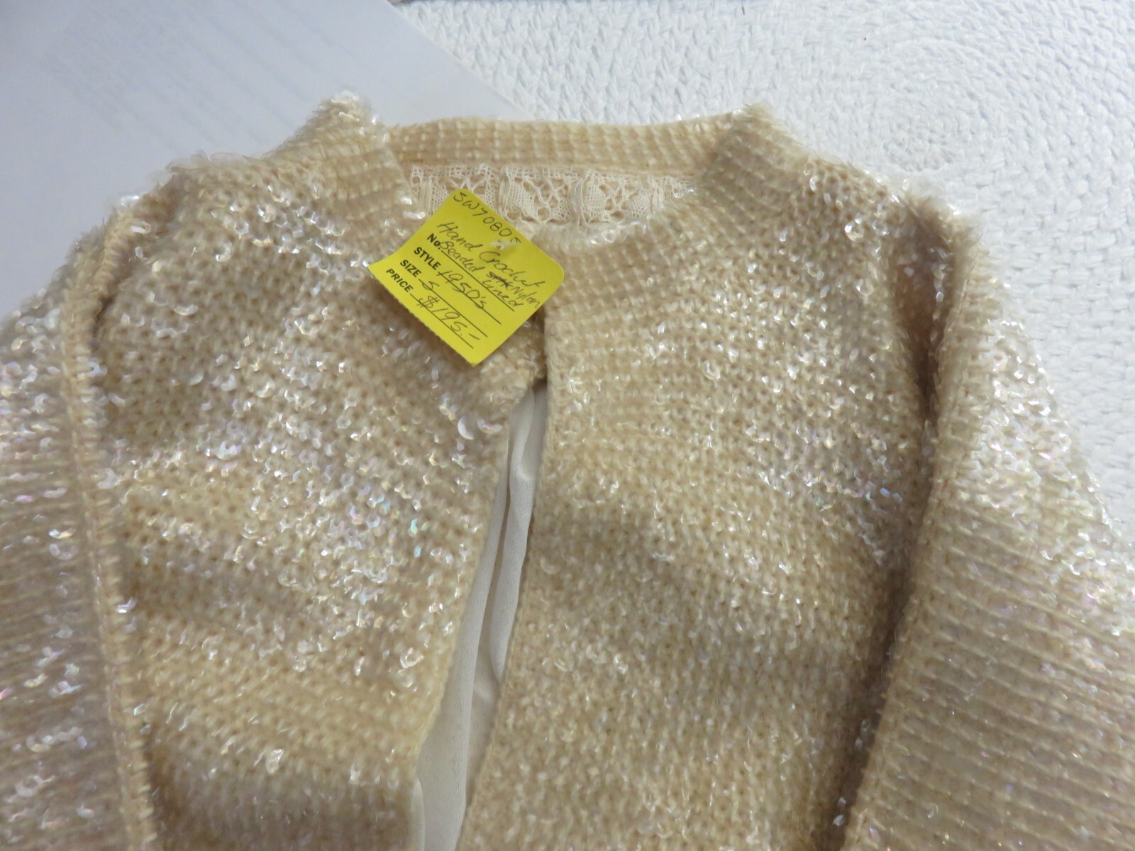 Vintage Hand crocheted 1950’s cardigan, sequin beaded, size small. Cream color