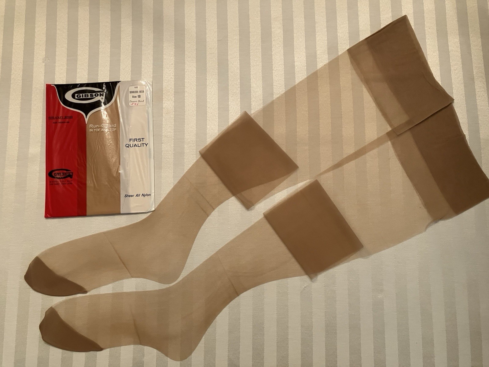 10 X 33 1/2” 12 PAIRS MINT NEVER OPENED RT MATCHING GARTER NYLON STOCKINGS BEIGE