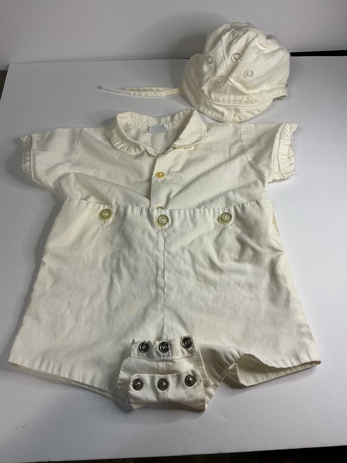 Vintage 1950s Santone romper, sailboat knit, and classic cardigans