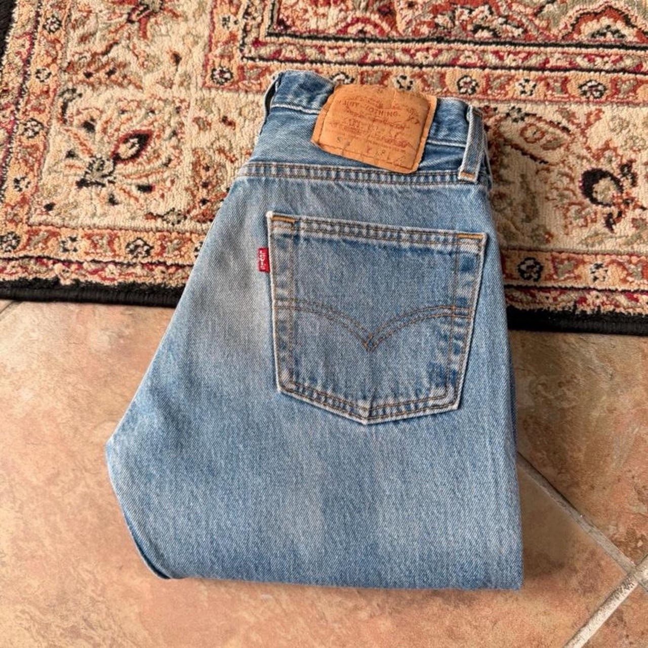Vintage Levi’s 501 Jeans 27×30 Made In USA Button Fly Straight Leg Light Wash