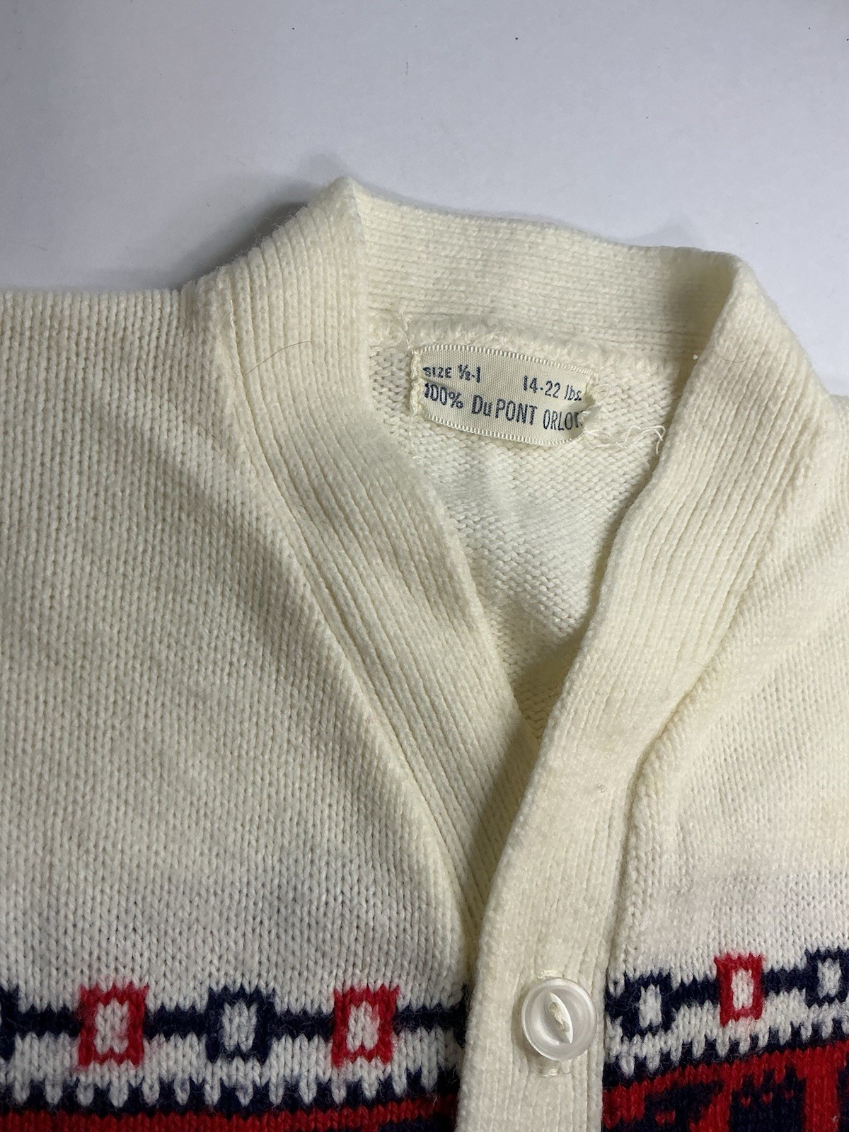 Vintage 1950s Santone romper, sailboat knit, and classic cardigans