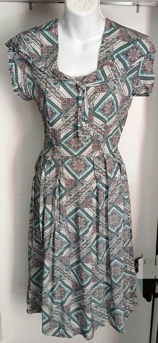 Unique & Flattering 40s handmade Rayon dress with cute tie around neck.Must See!