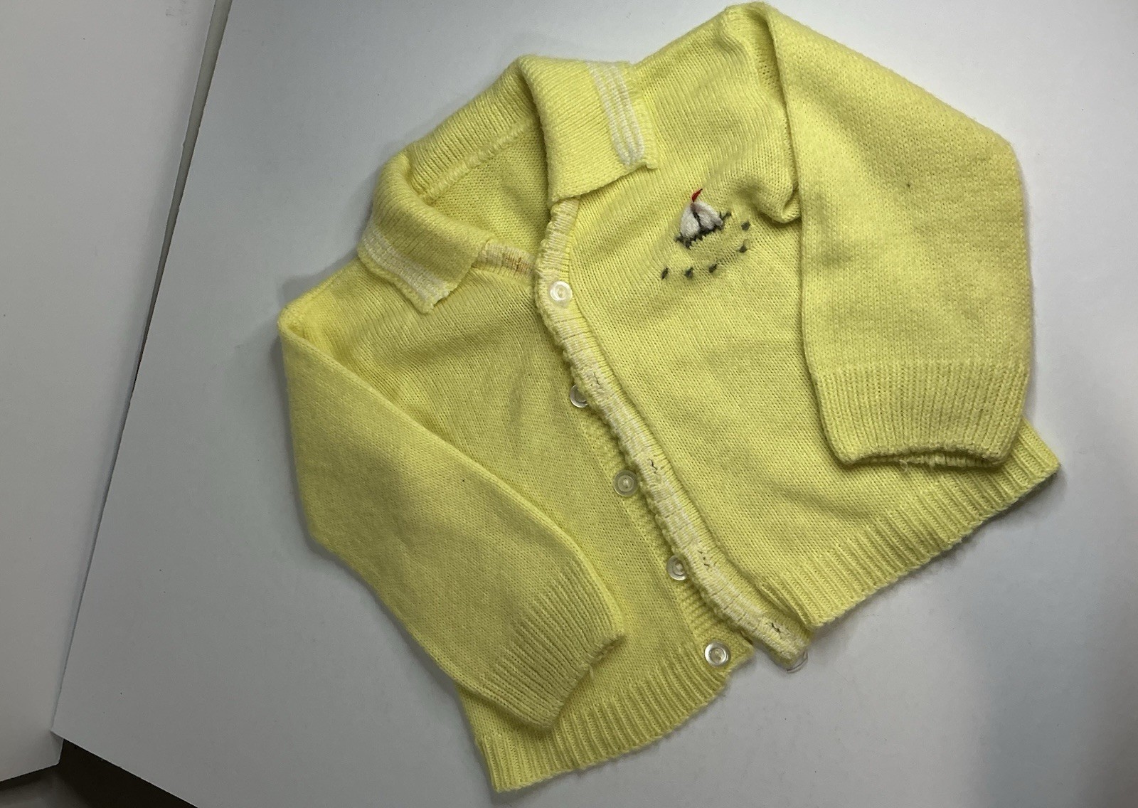 Vintage 1950s Santone romper, sailboat knit, and classic cardigans