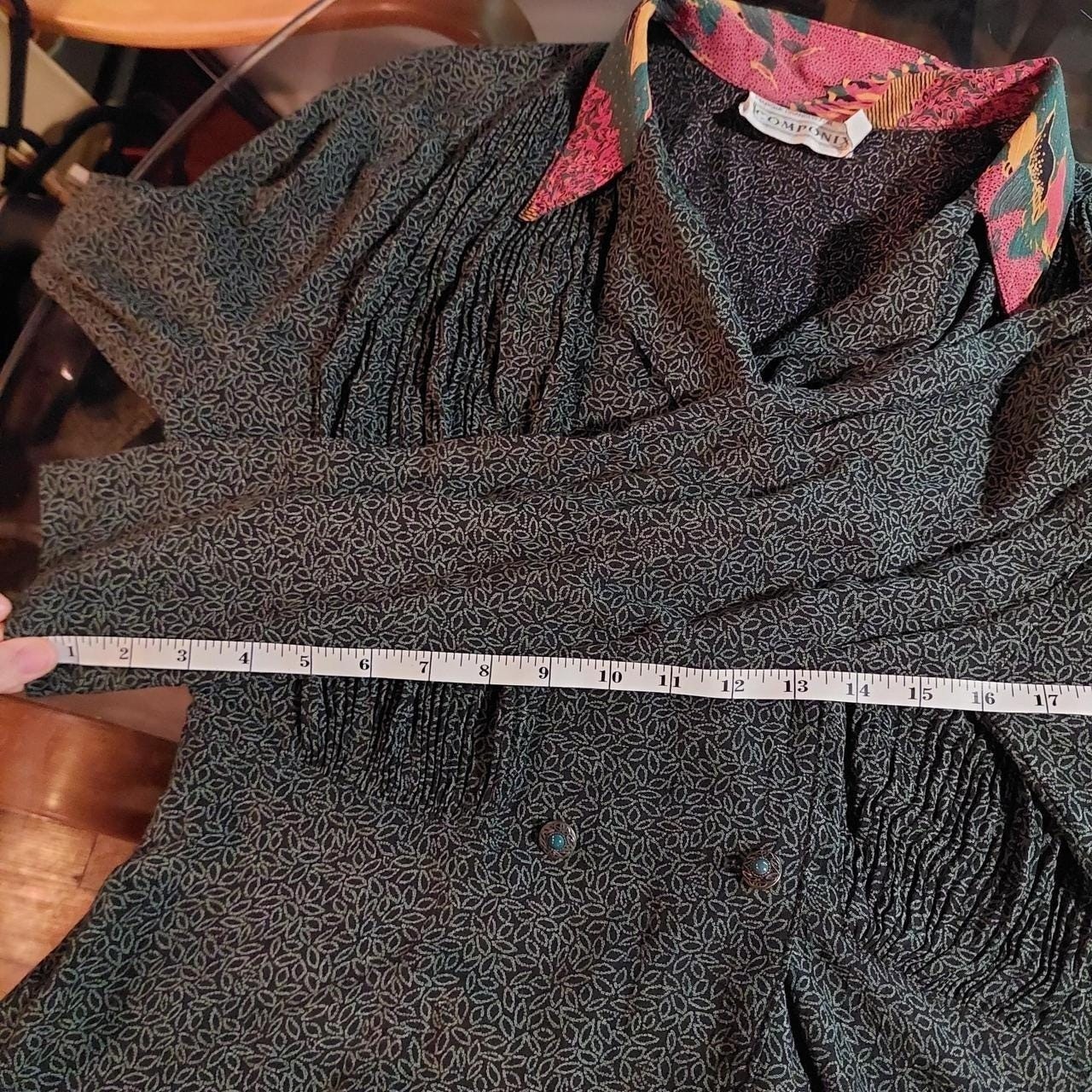 Vintage green and black leap pattern with a orange patterned collar button top.