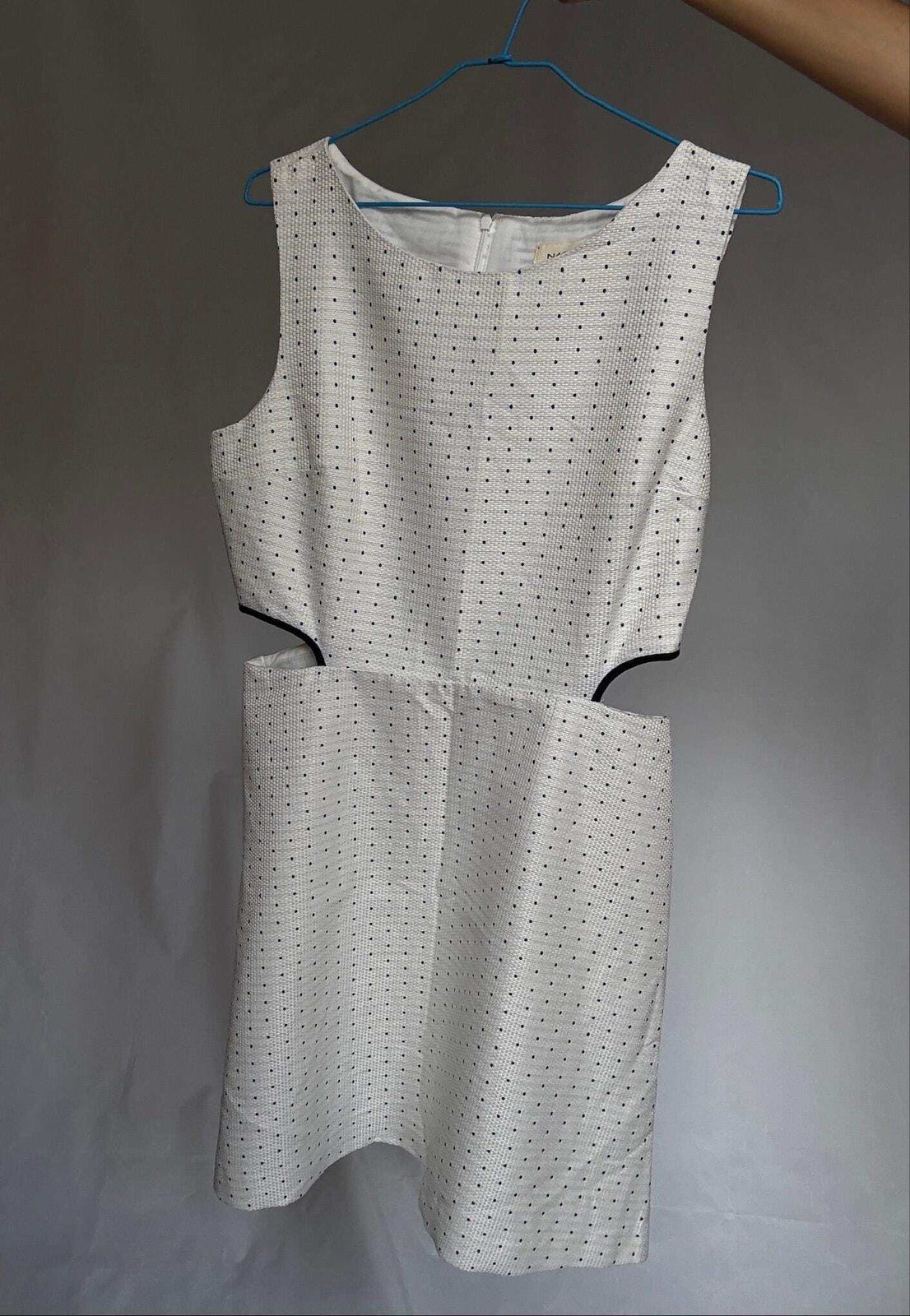 Cotton mini dress with side cutouts, Size US M, White outfit with navy dots