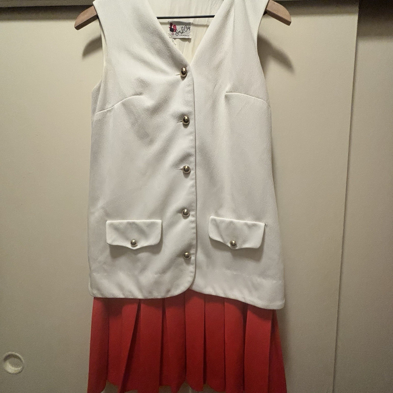 1960’s Mod style Eve Le Coq Mod white vest Attached Orange Pleated Skirt