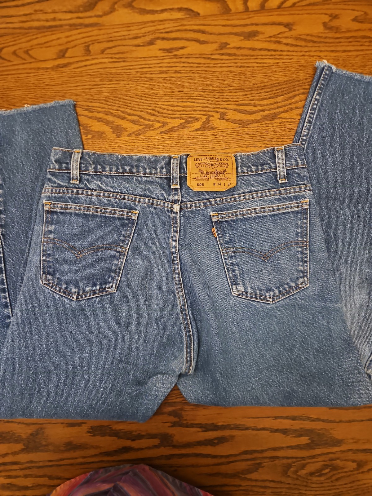 Vtg 1985 Levi’s 505 Jeans Orange Tab 33×27 Cropped Ankle Raw Hem Med Wash Denim
