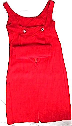 Vintage cocktail dress. Size 6-8. Separate 12″ back panel, 2 large rhinestones