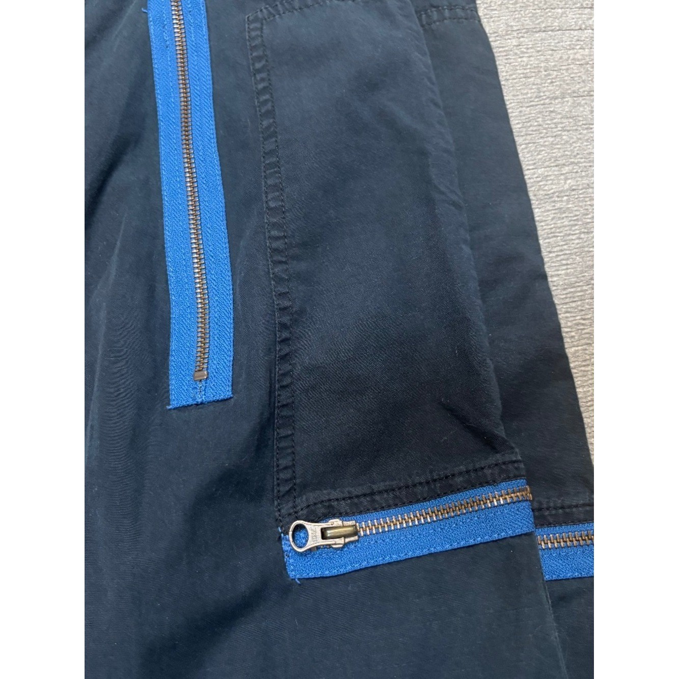 Vintage Ralph Lauren utility cargo pants with striking cobalt blue zipper accent