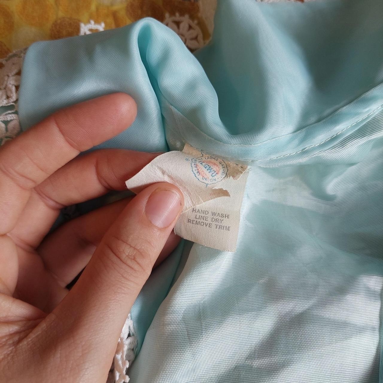 Vintage baby blue dress/ tunic with sheer sleeves, lace trim, and pearl buttons.