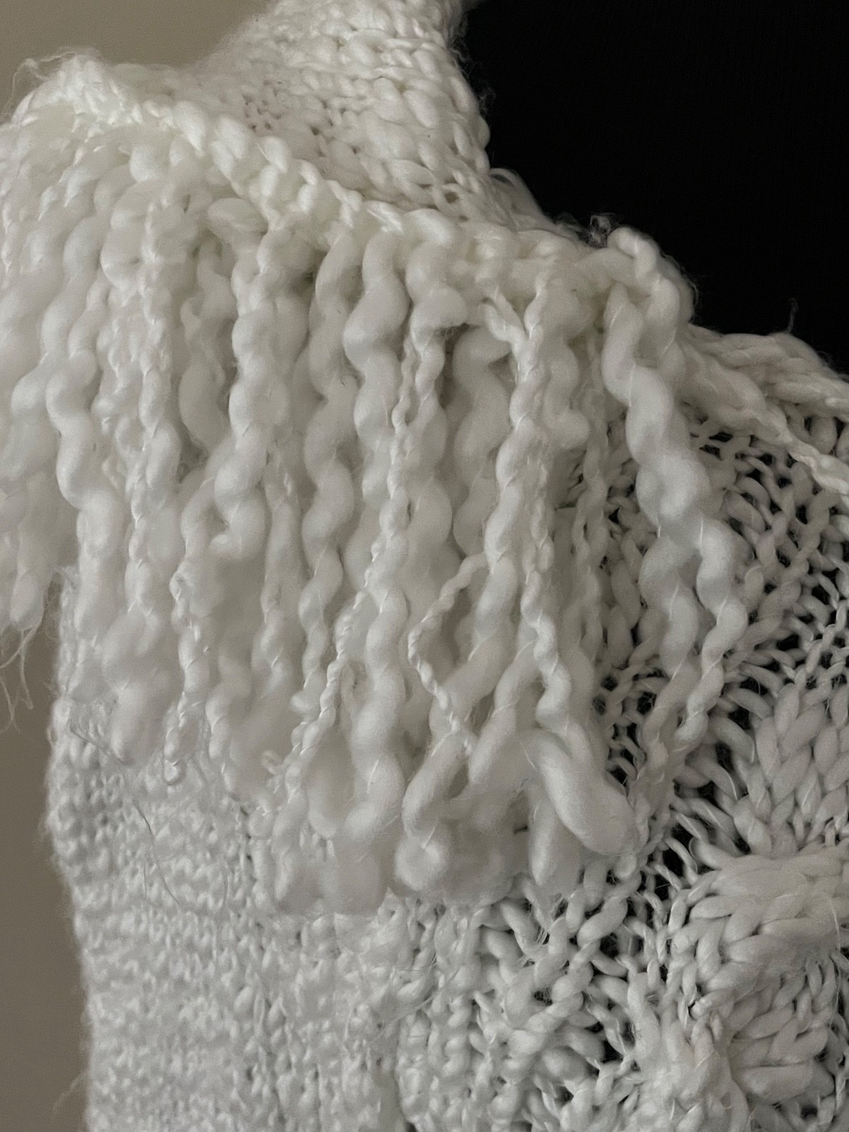 Adorable vintage white knit poncho with hood, fringe and pom poms