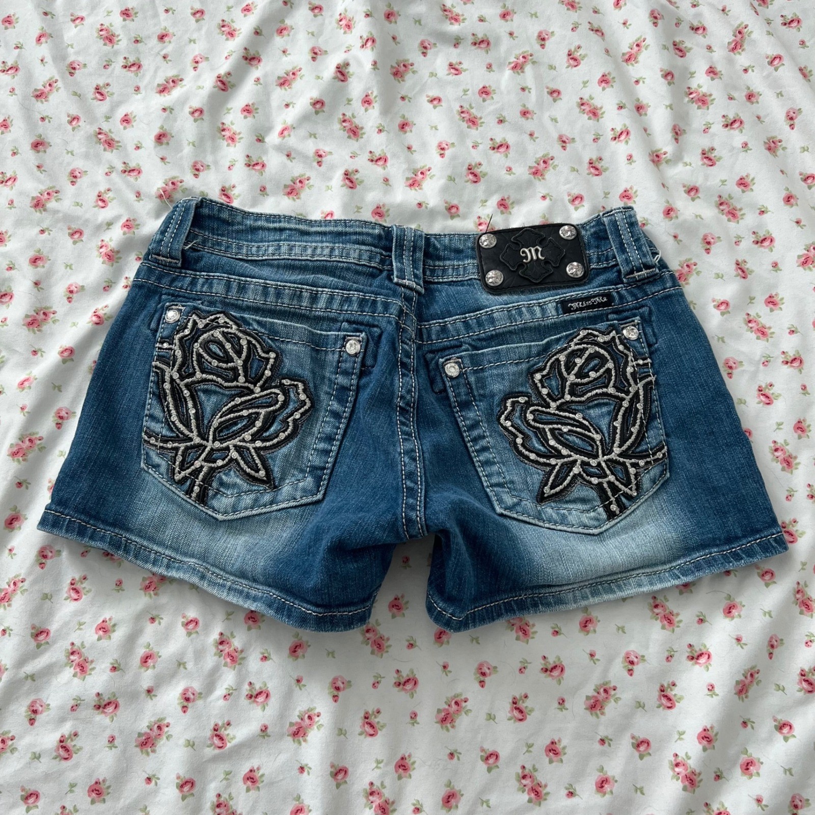 vintage y2k miss me low rise denim shorts with rose embellished back pockets
