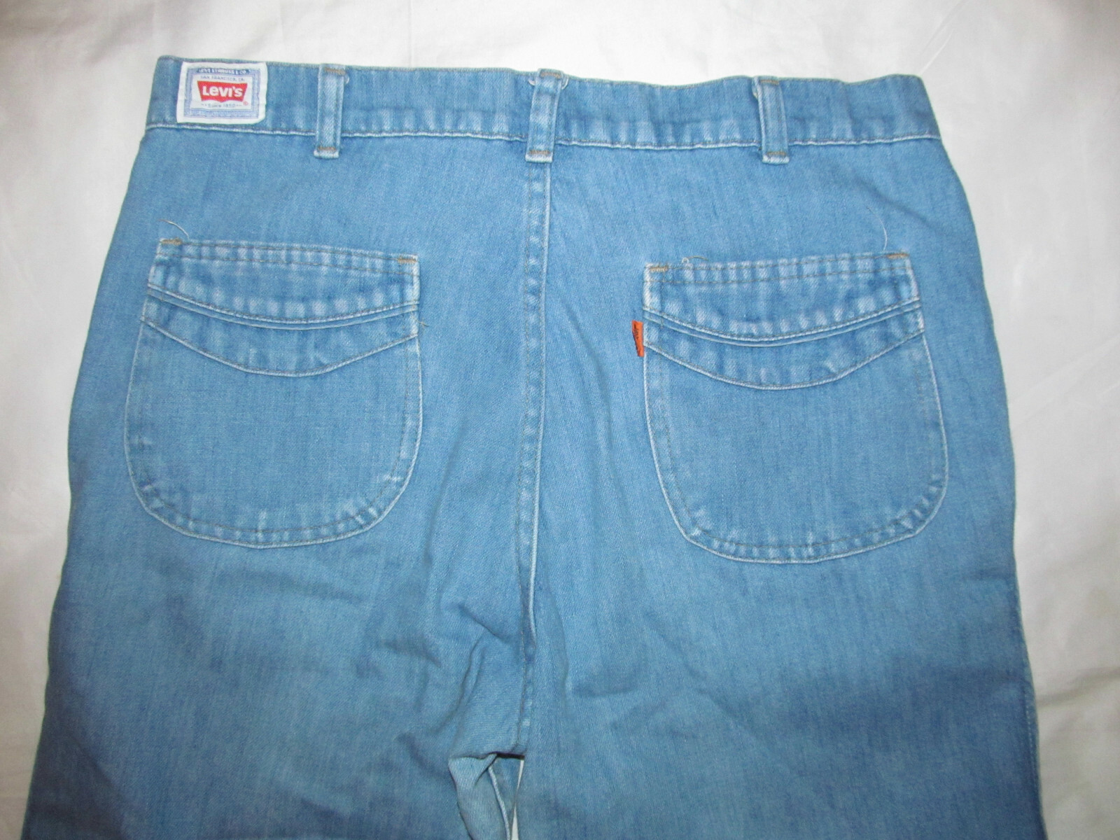 vintage 60’s 70’s LEVI’S light wash trousers wide leg jeans W 32″