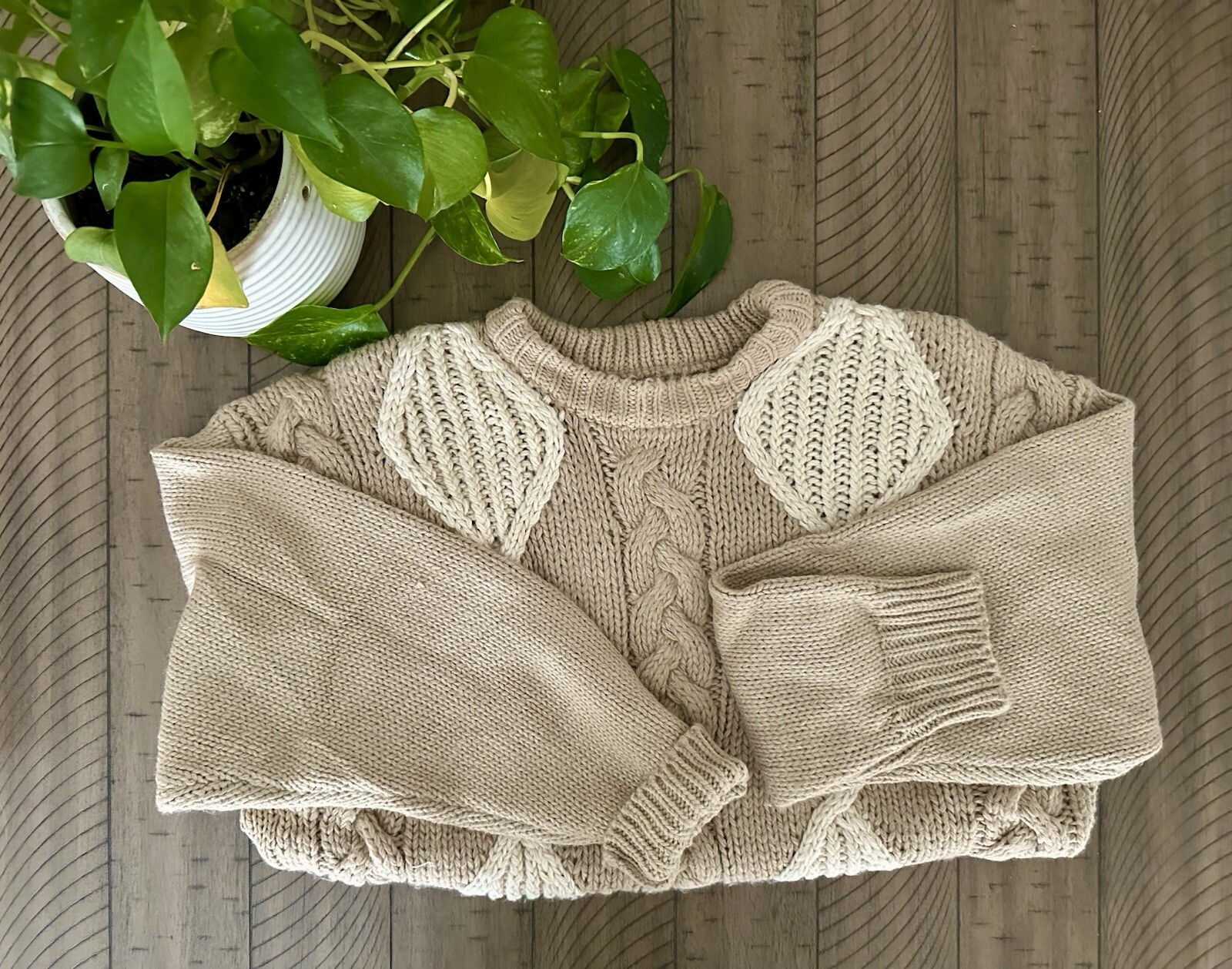 Cozy up in this charming pre-loved oversized Grandmom sweater!