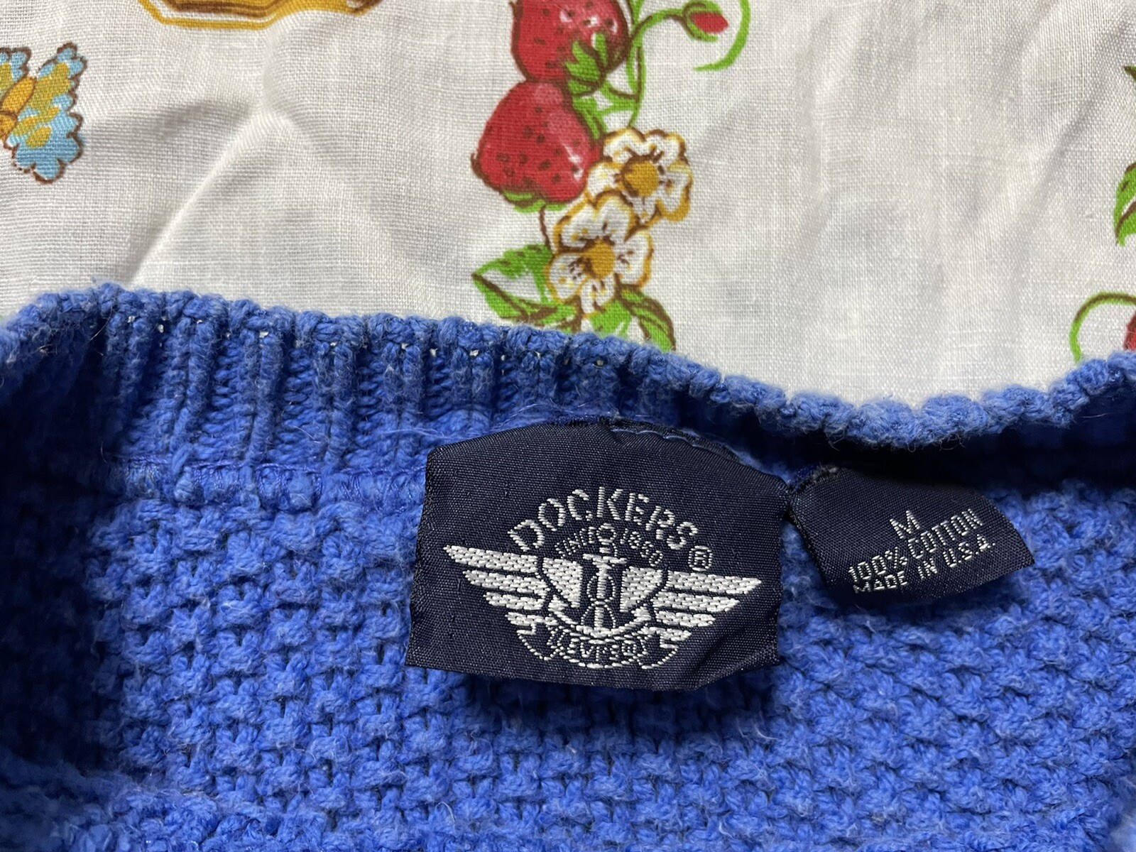 vintage 1980s dockers ladies blue knitted logo symbol sweater. Size medium