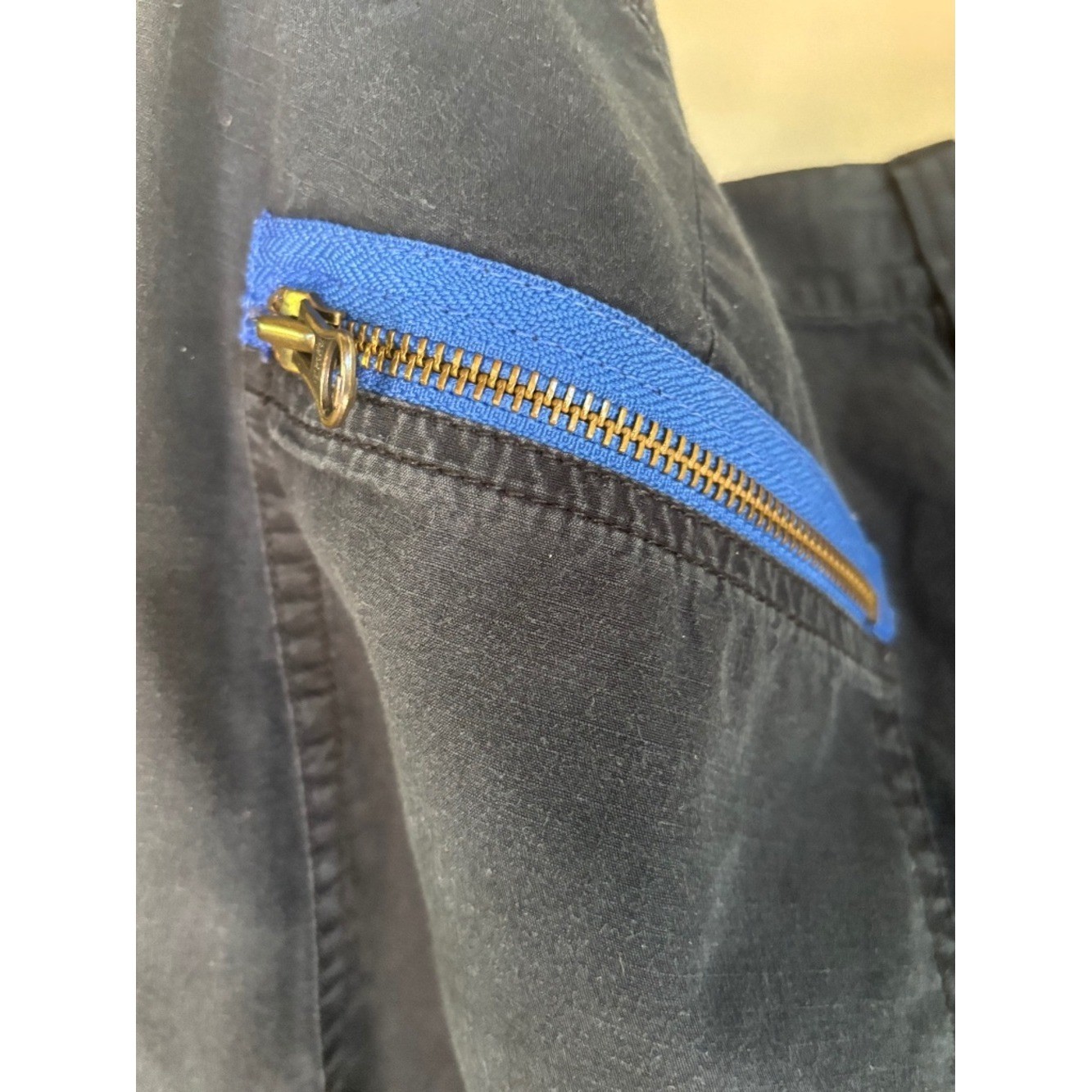Vintage Ralph Lauren utility cargo pants with striking cobalt blue zipper accent