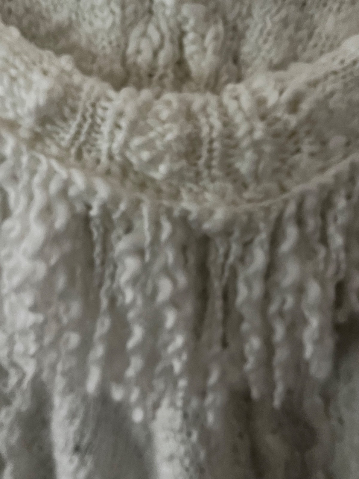 Adorable vintage white knit poncho with hood, fringe and pom poms