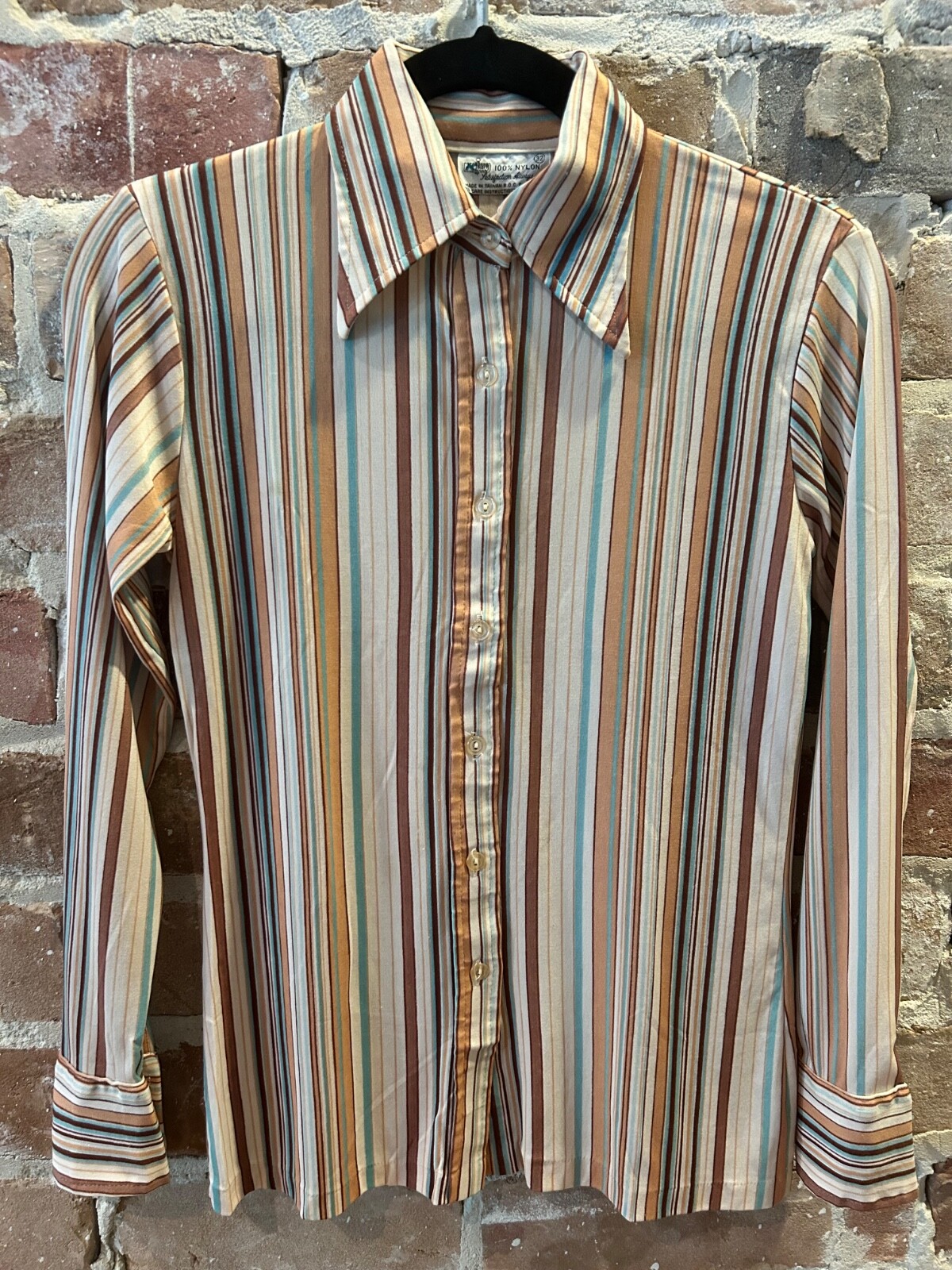 1970s woman’s brown, teal, cream stripe long sleeve, excellent condition