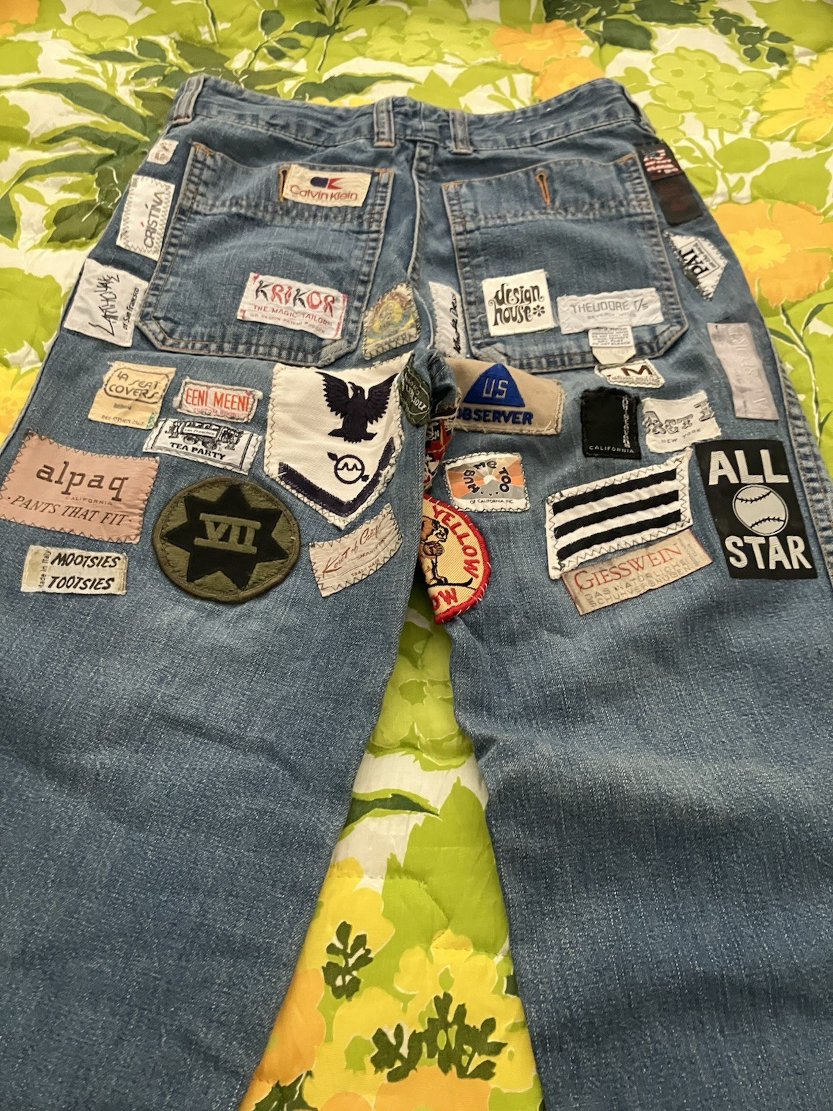 Vintage 1970’s Women’s Chemin De Fer blue jeans with patches.