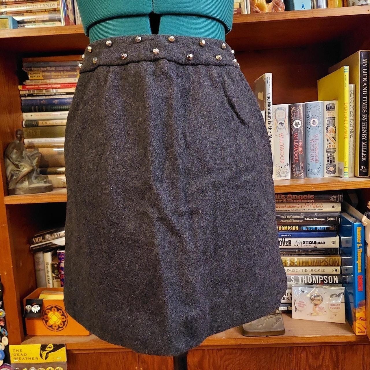 Vintage dark grey mini skirt with metal zipper and metal stud details.