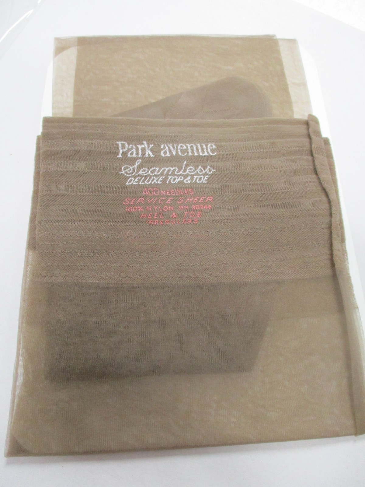 1 PR VINTAGE PARK AVE RHT FLAT KNIT SHEER SHINY NYLON STOCKINGS 10 1/2 MED TAUPE