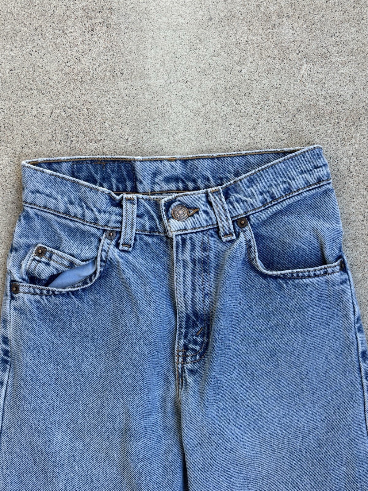 Vintage 1990s Levi’s Orange Tab Jeans. 23” Waist, 27” Inseam .