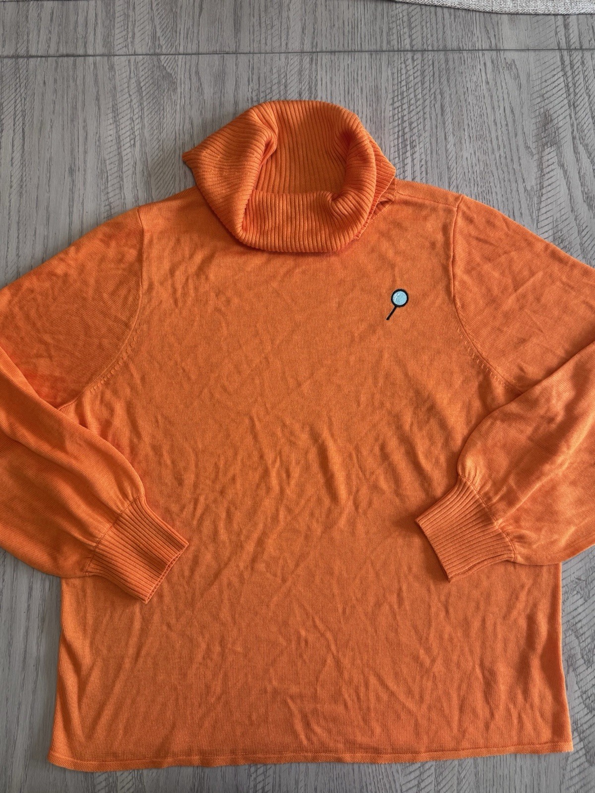 Scooby Doo Velma Turtleneck Pullover Sweater. Acrylic knit fabric. 100% acrylic.