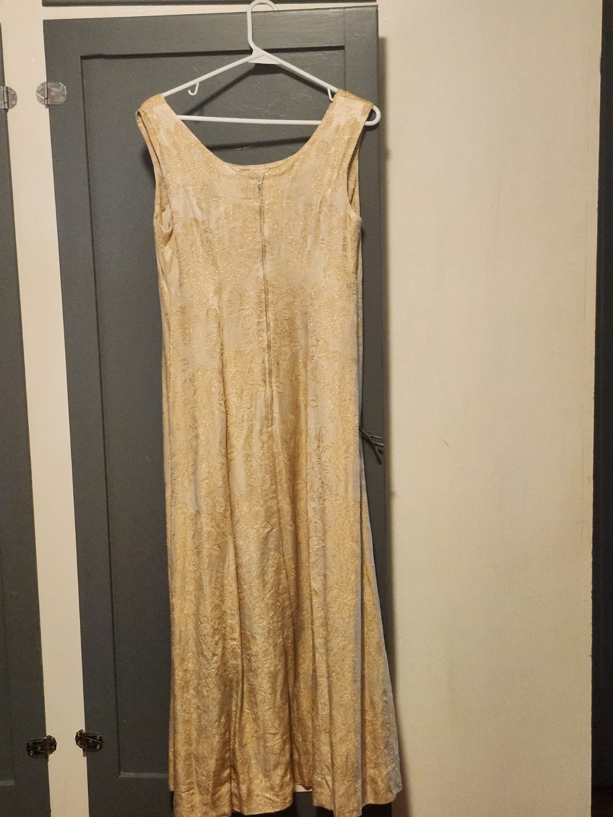 1960s gold floral brocade maxi dress featuring a scoop neckline Size S