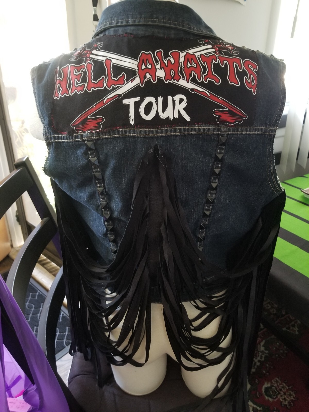 Denim Slayer Hell Awaits Tour patch vest with studs And, fringe.