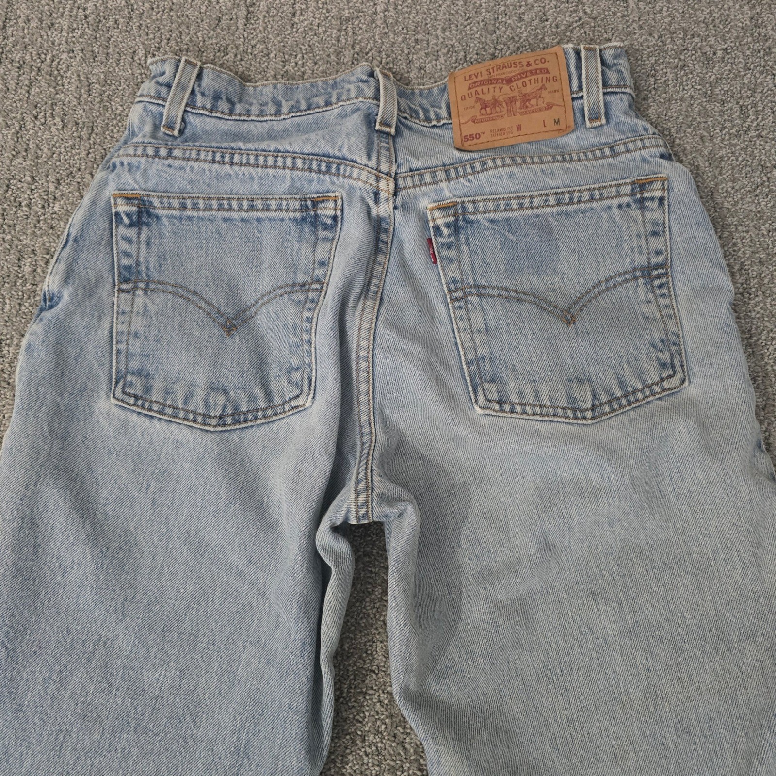 Vintage Levi’s 550 Relaxed Fit Tapered Leg Jeans Light Wash USA 9 JR 90s