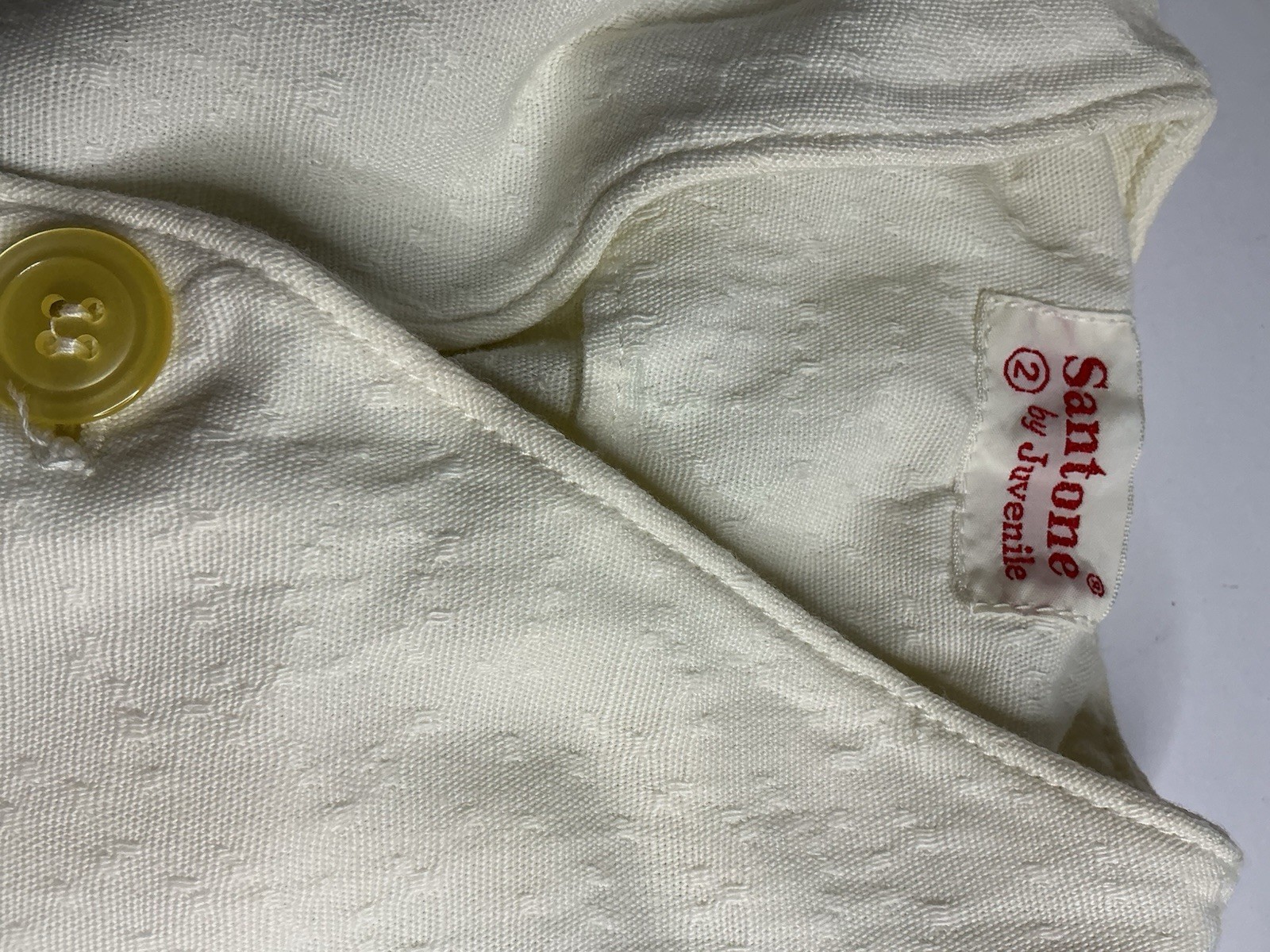 Vintage 1950s Santone romper, sailboat knit, and classic cardigans