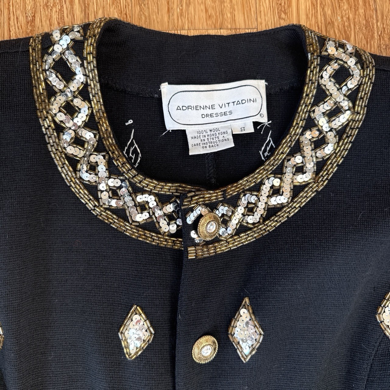 VNTG 1980s Adrianne Vittadini BLK blazer with sliver and gold embellishments.