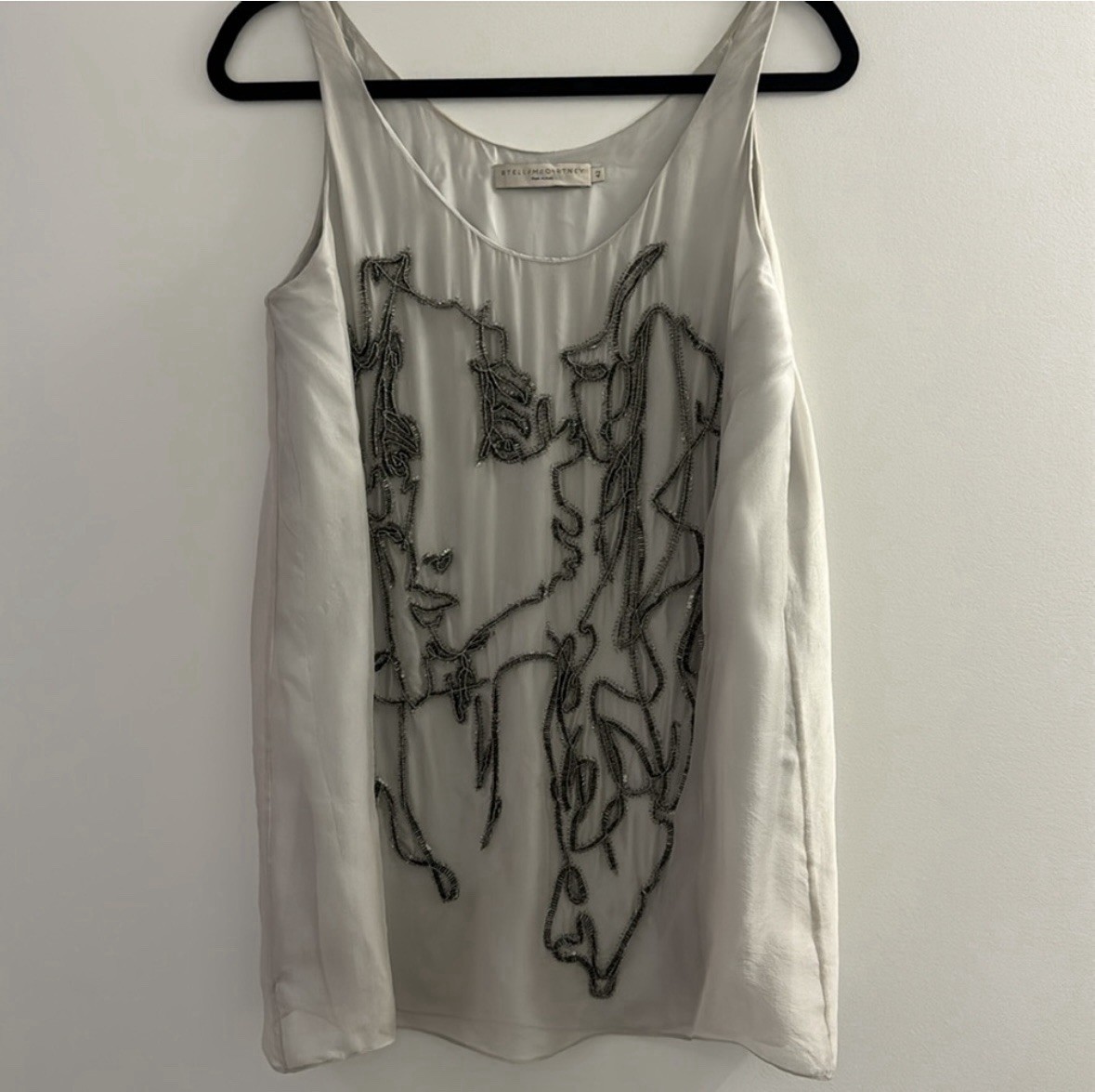Stella McCartney Hand Embroidered, silk mini dress with an abstract beaded face.