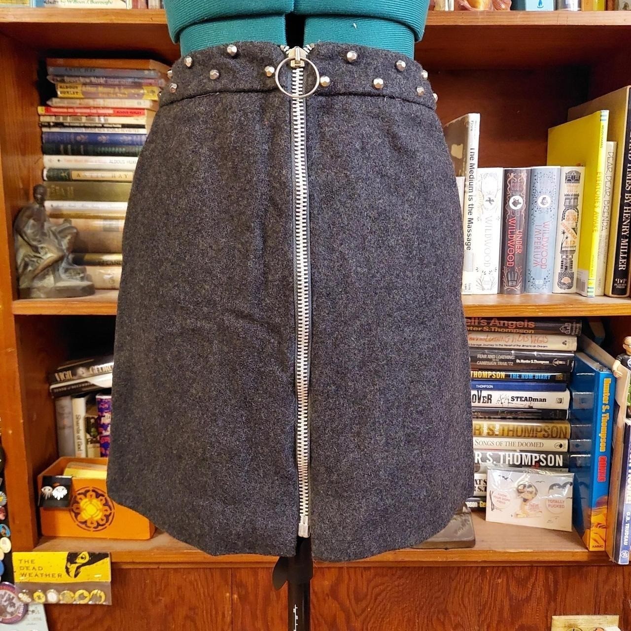 Vintage dark grey mini skirt with metal zipper and metal stud details.