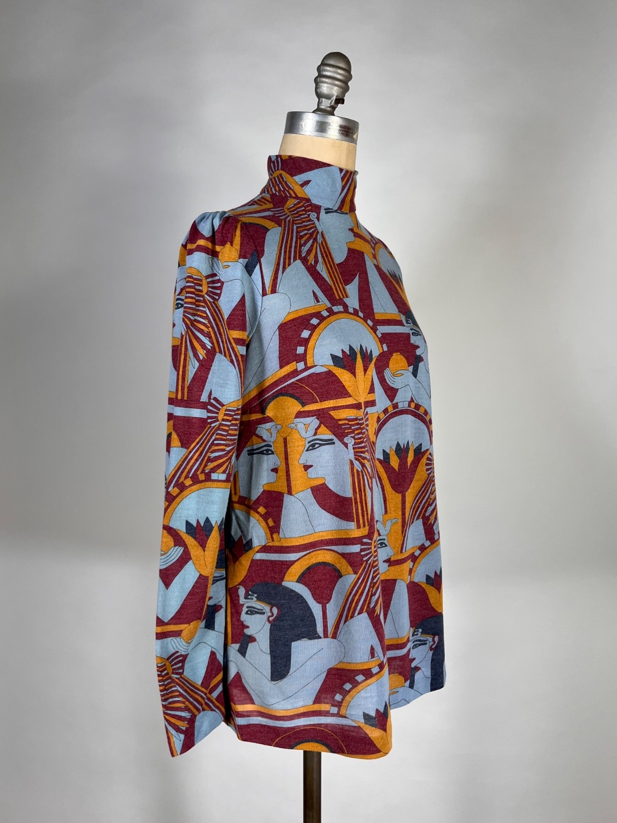 Vintage 1960’s-70’s blue EGYPTIAN print medium-weight knit top by Add 1 Ltd. S/M