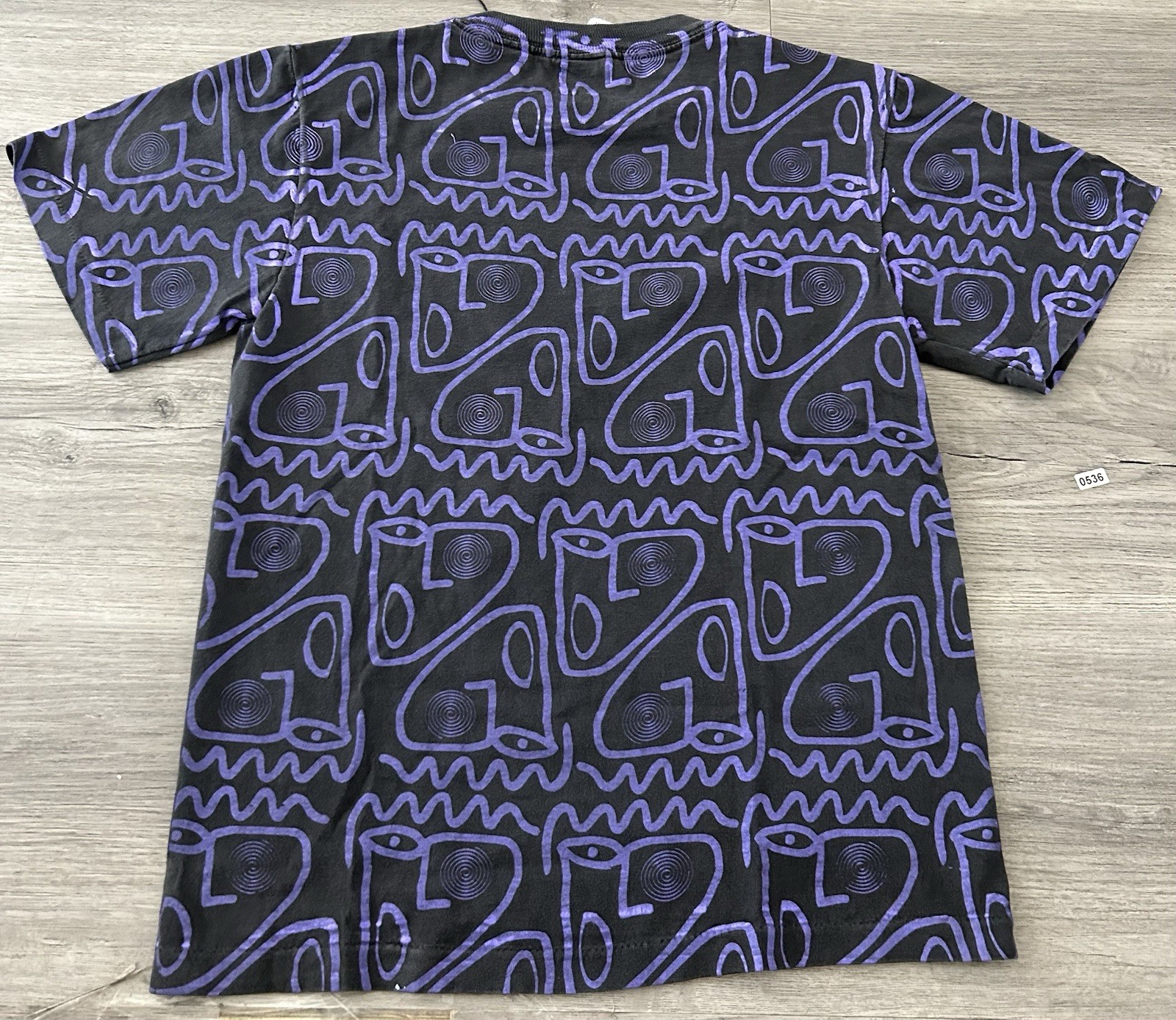 Vintage 90s Ocean Pacific AOP black graphic tee with purple accents USA Made
