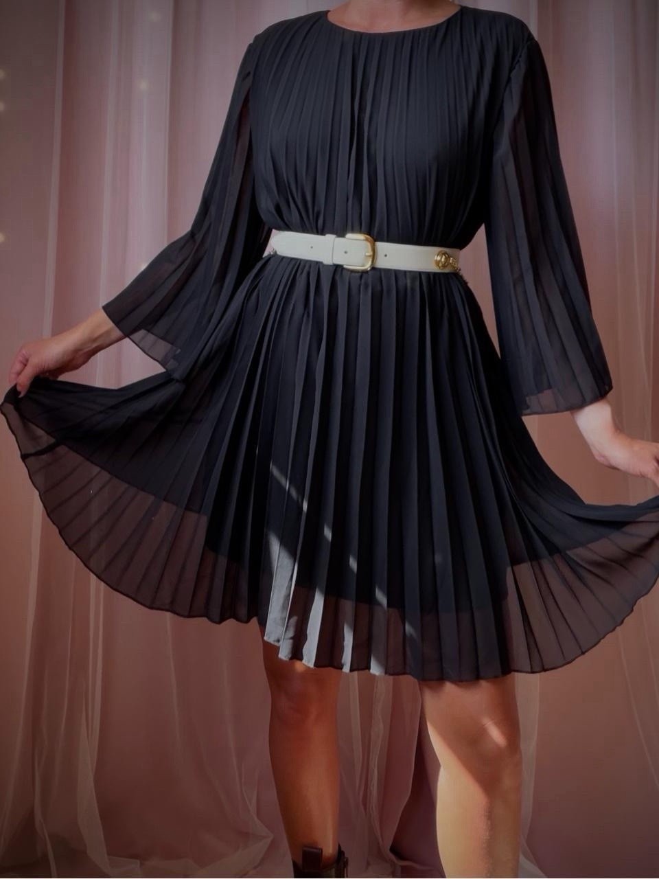 1960s-style black accordion pleated dress