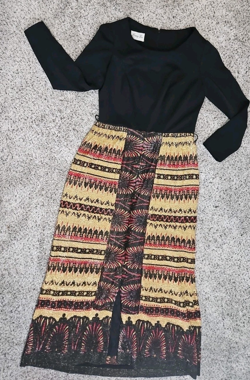 Vintage Henry Lee black long-sleeved dress with a lurex-style midi skirt. 14
