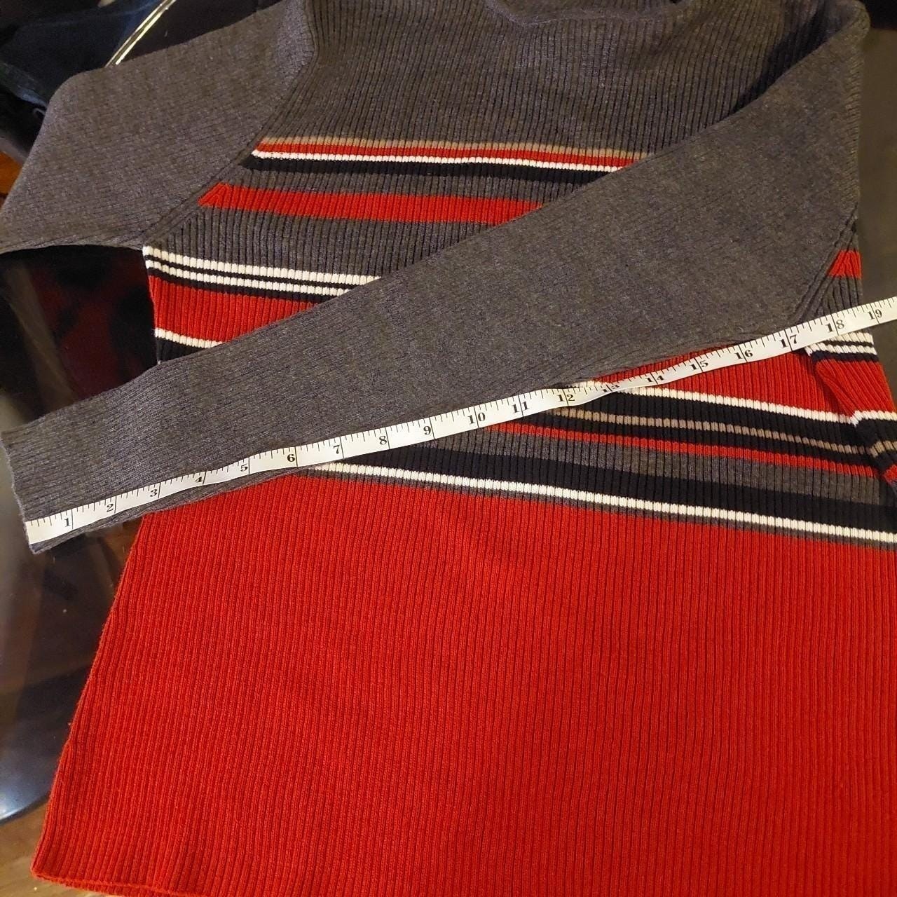 Vintage striped red, grey, and black long sleeve turtle neck sweater.
