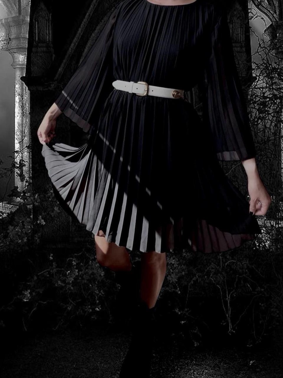 1960s-style black accordion pleated dress