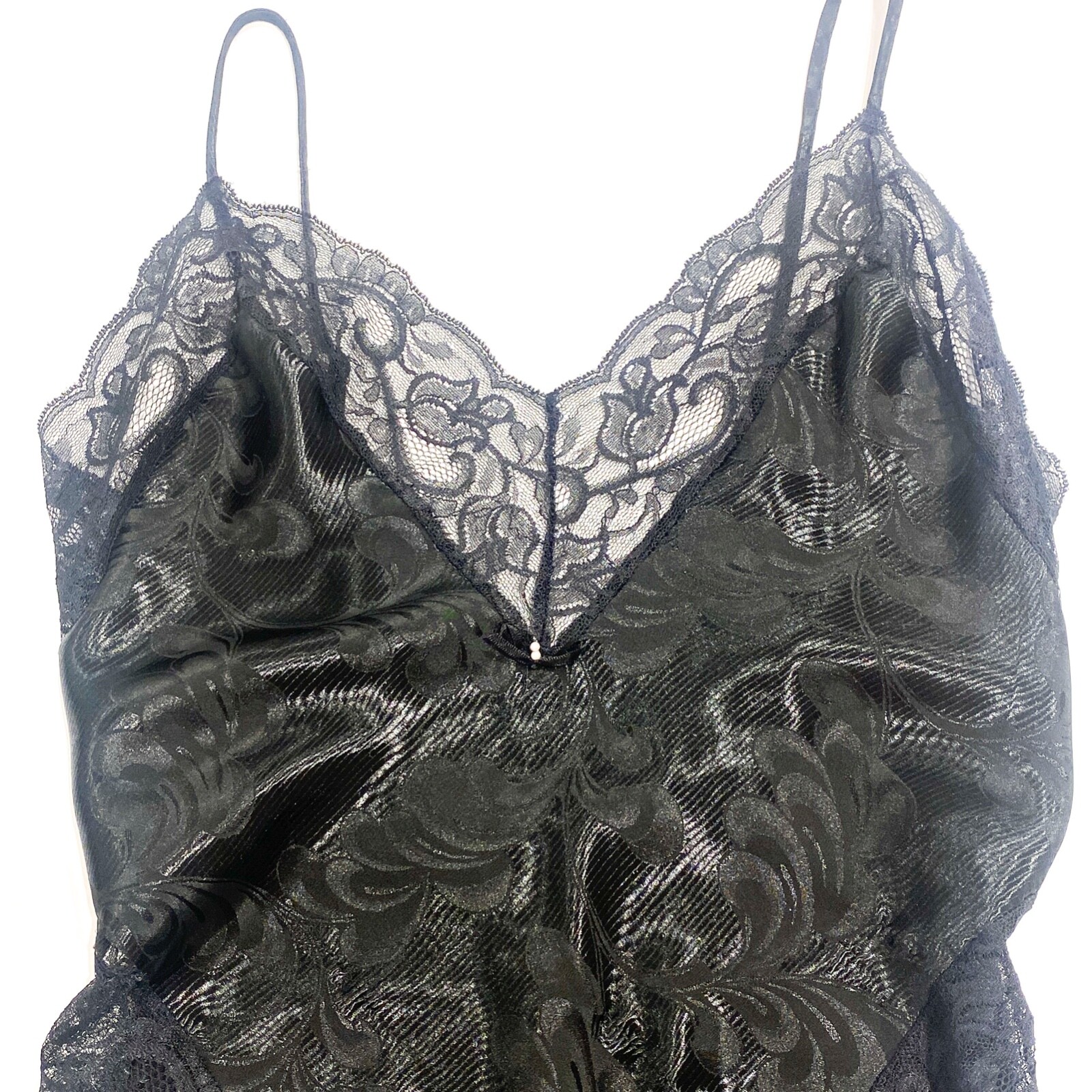 Vintage Lingerie. Black with lace trim and floral print on fabric. Thin spaghett