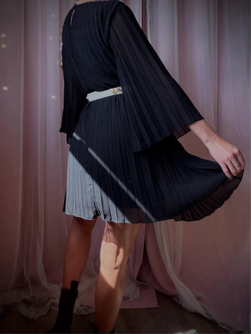1960s-style black accordion pleated dress