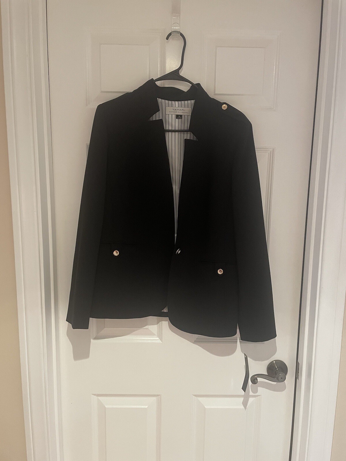 Tahari Arthur S. Levine 2 piece garment, blazer and pants. Size 10. Color black.