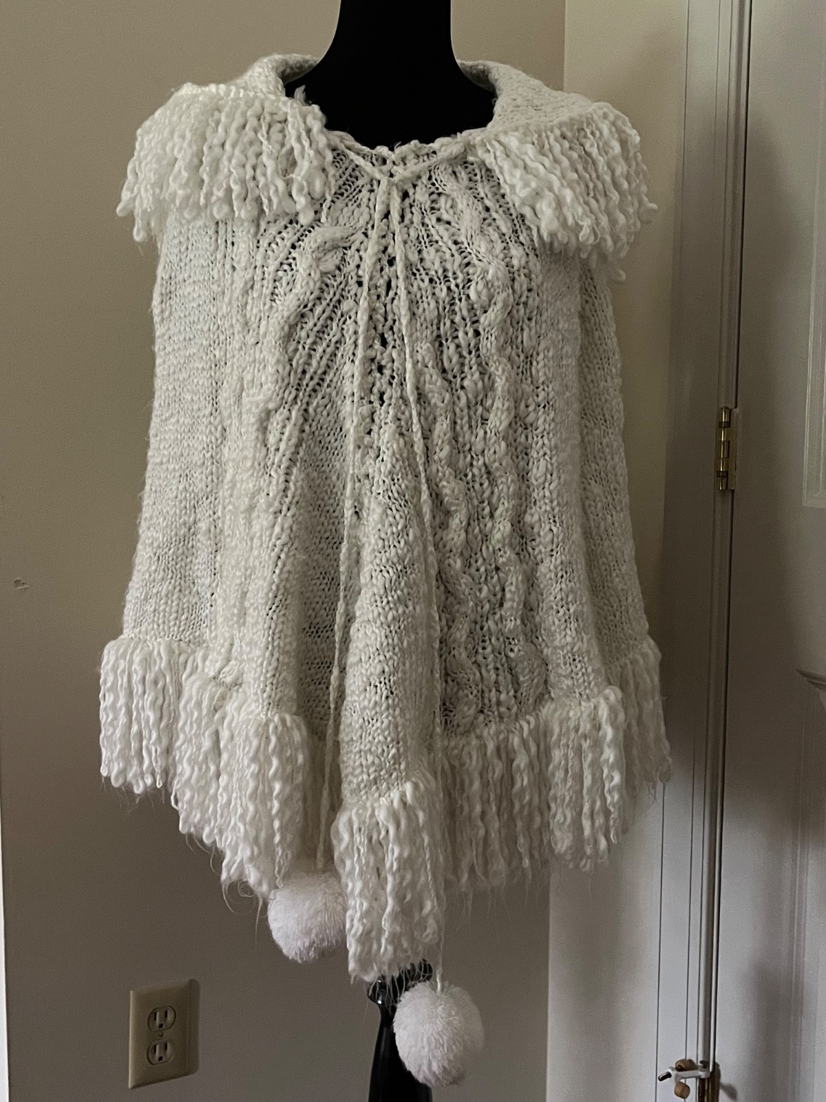 Adorable vintage white knit poncho with hood, fringe and pom poms